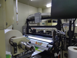 検知器付きPP貼り機